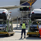 Illustration for article titled How To Load 31 Porsches Into A Cargo Plane